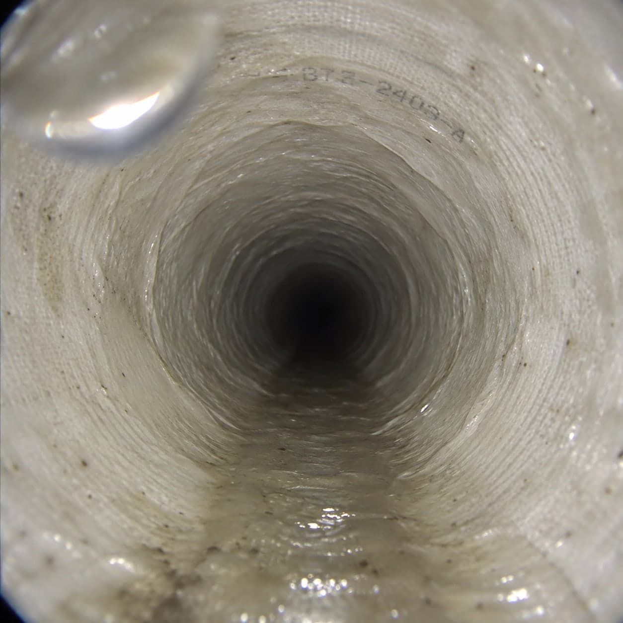 Illustrative inspection view of a smooth finished liner inside a pipe